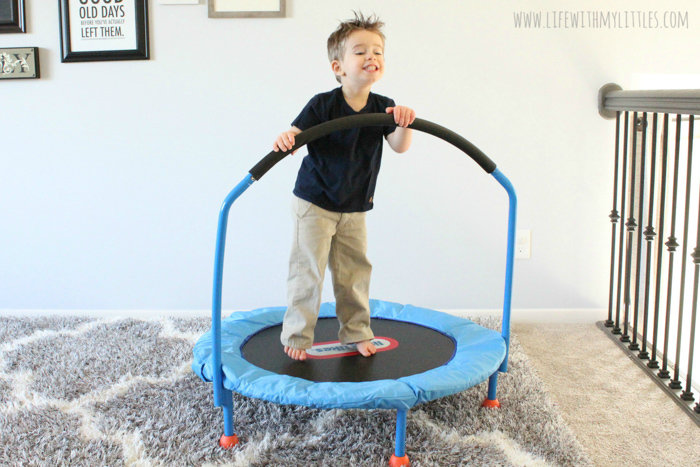Toddler jumping on Little Tikes trampoline
