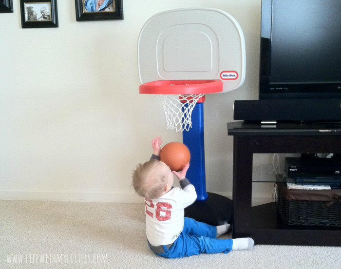 Baby with Little Tikes basketball