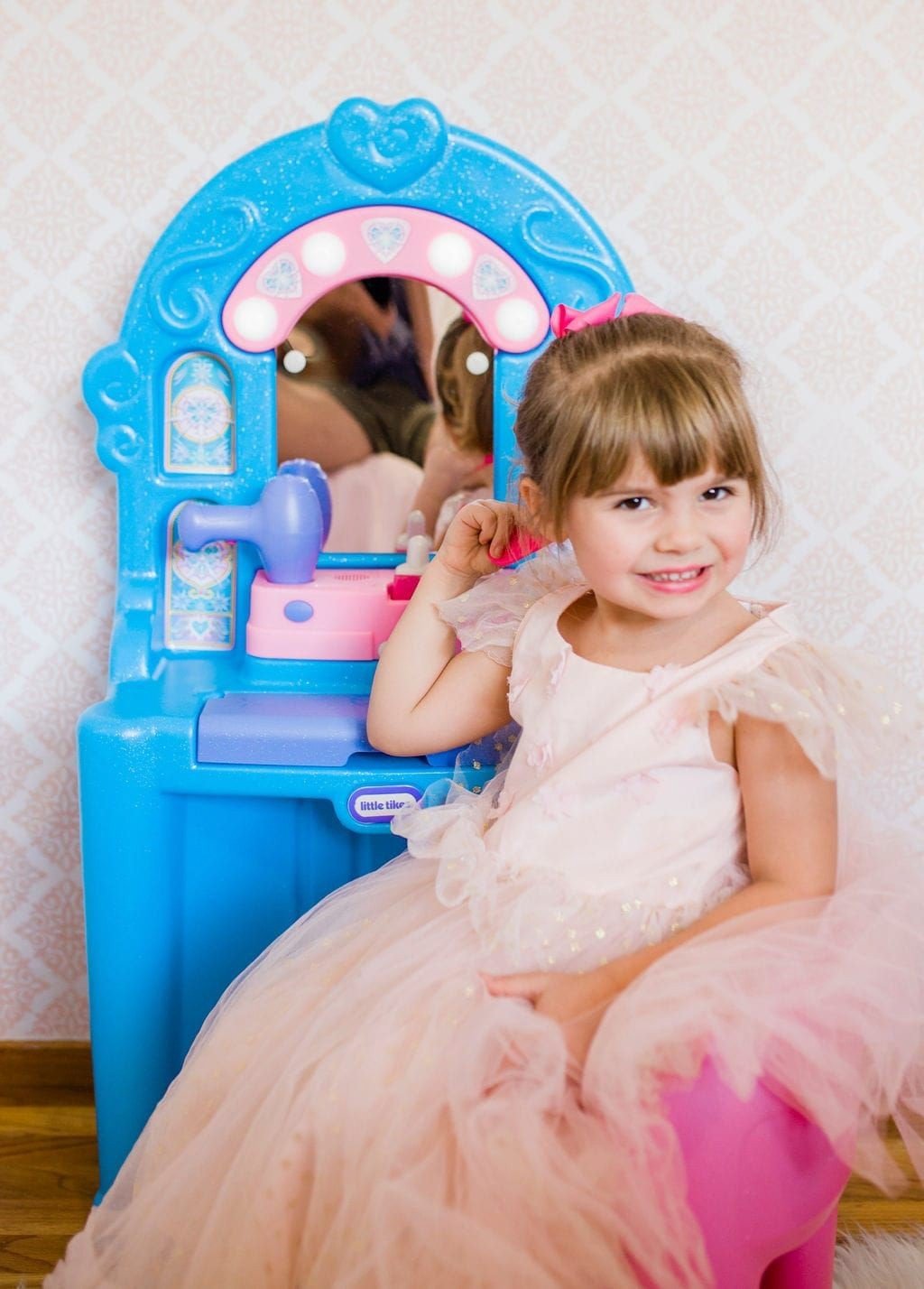 little girl playing with Little Tikes Ice Princess Magic Mirror Set