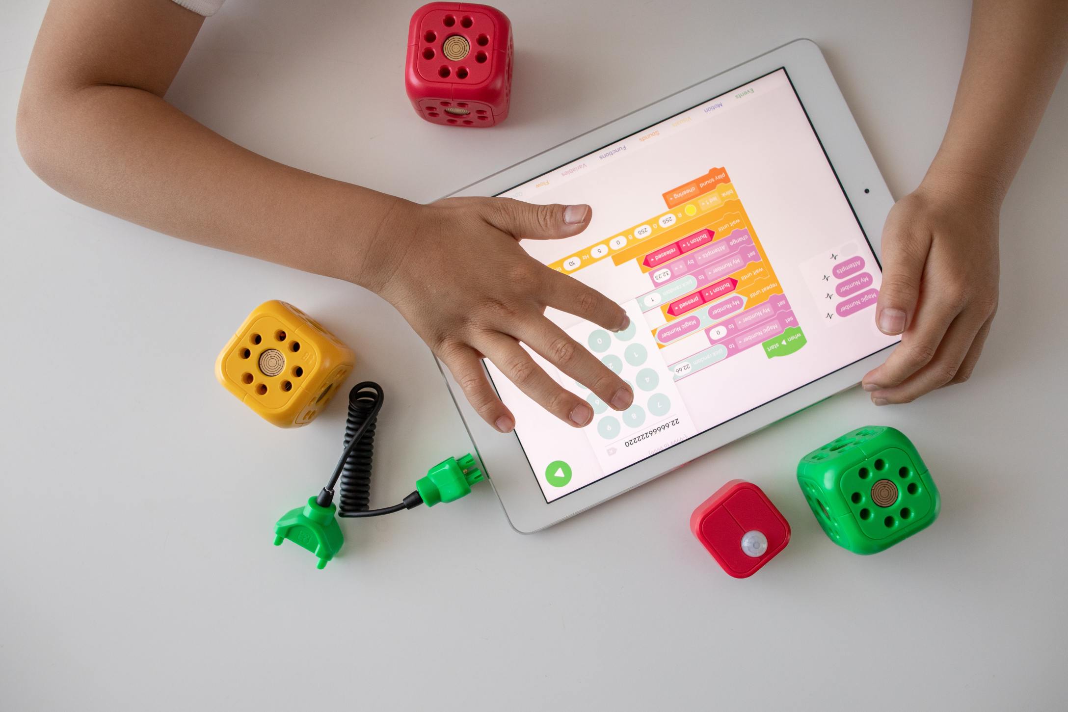 Girl playing online games on ipad