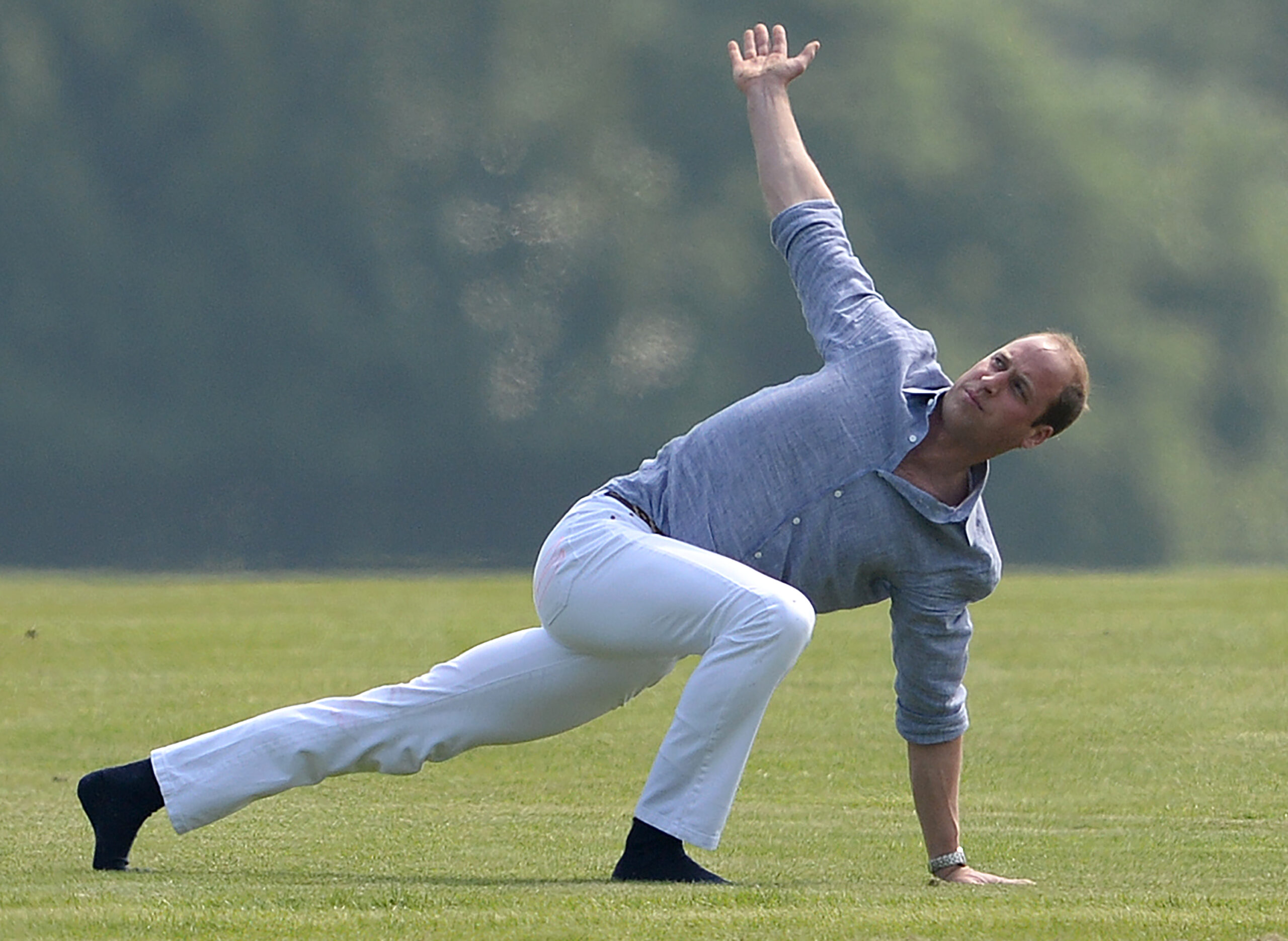 Prince William and Prince Harry play in the Audi Polo Challenge