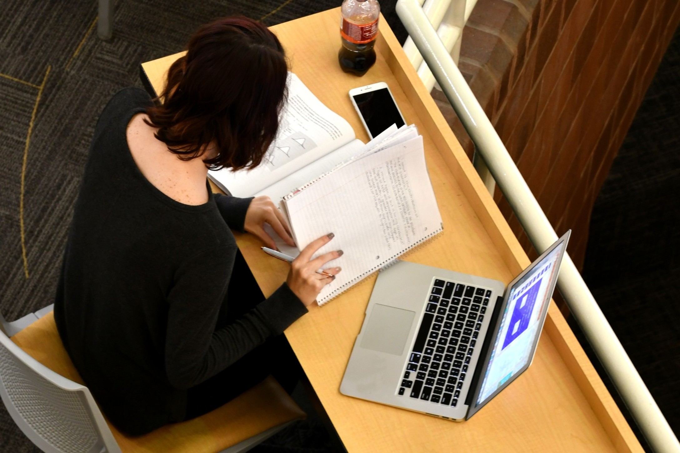 studying-her-notes-aerial-view-overhead-view-looking-down-from-above-vcu-virginia-commonwealth_t20_bAEPXm-1.jpg