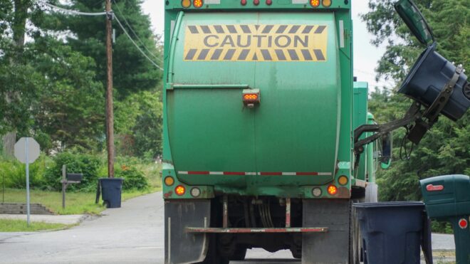 Baby in Trash Truck