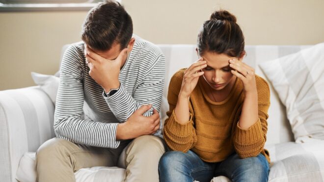 couple sitting on couch
