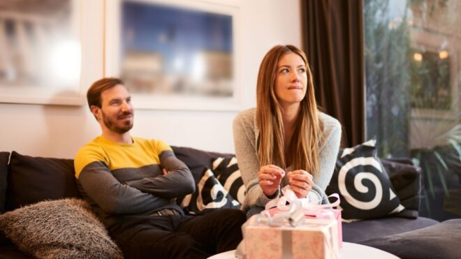 man-woman-couch-present