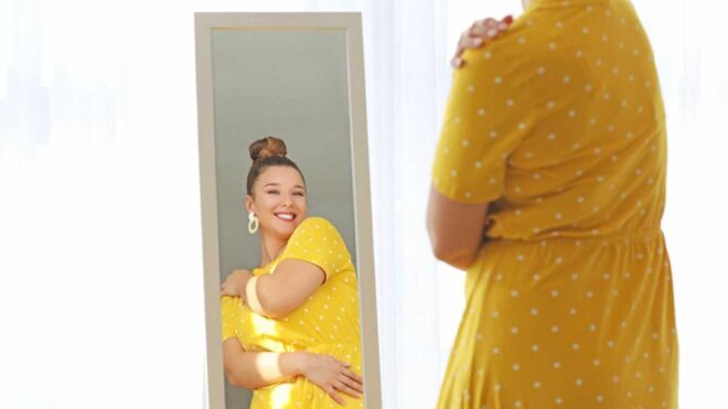 woman-embracing-body-image-in-mirror-1600x900