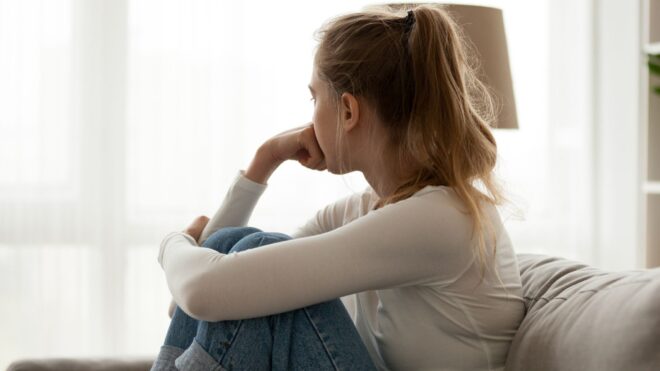 woman-sad-bedroom