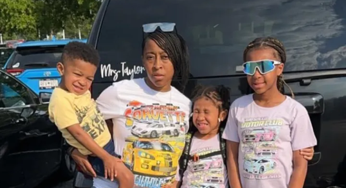 Crystal Taylor holding son Derrick Taylor and standing next to Harmony and Cassidy Taylor