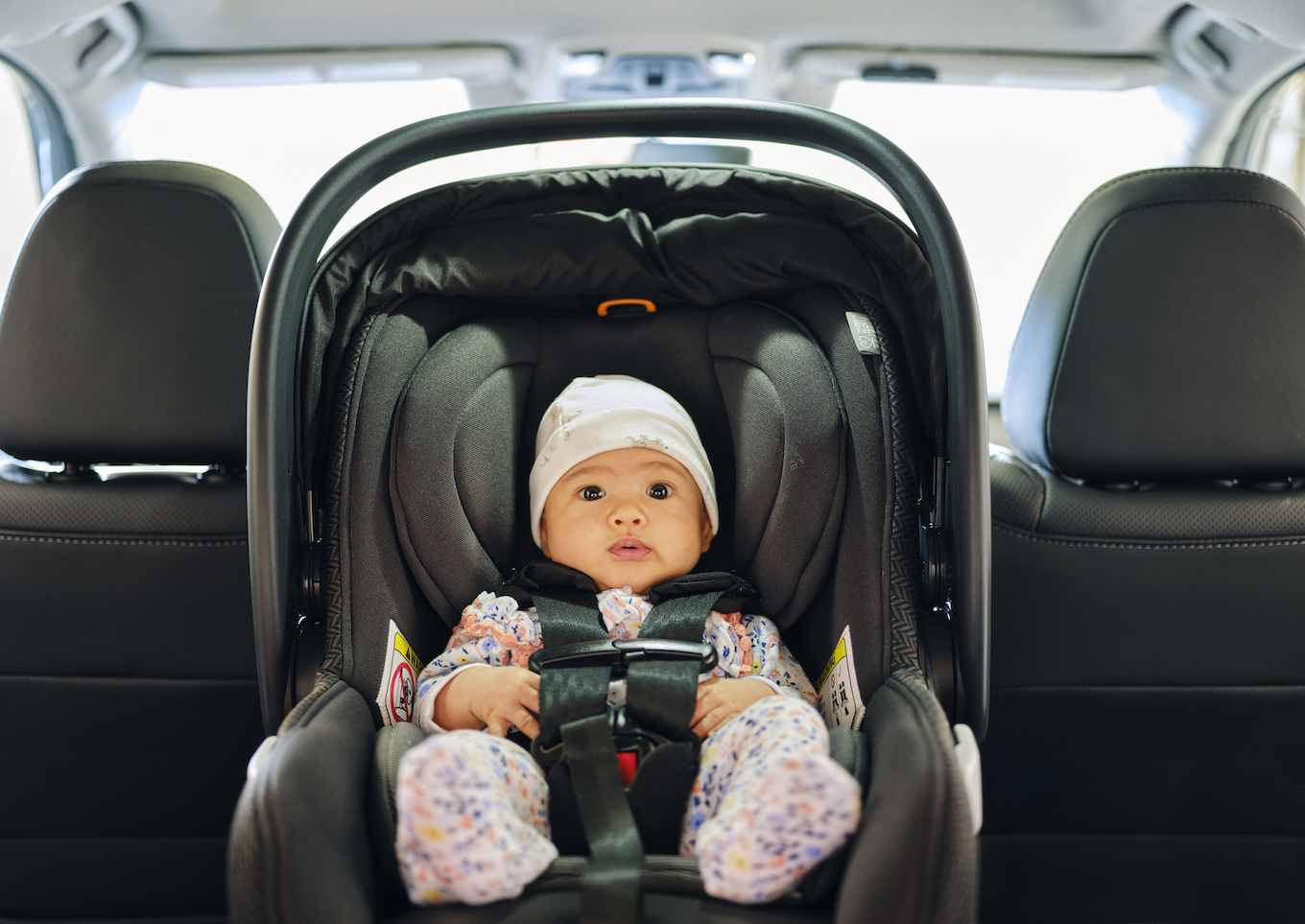 baby in a carseat