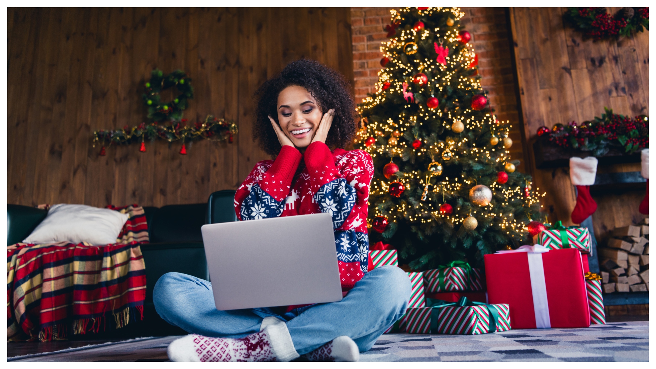 woman on laptop at Christmas
