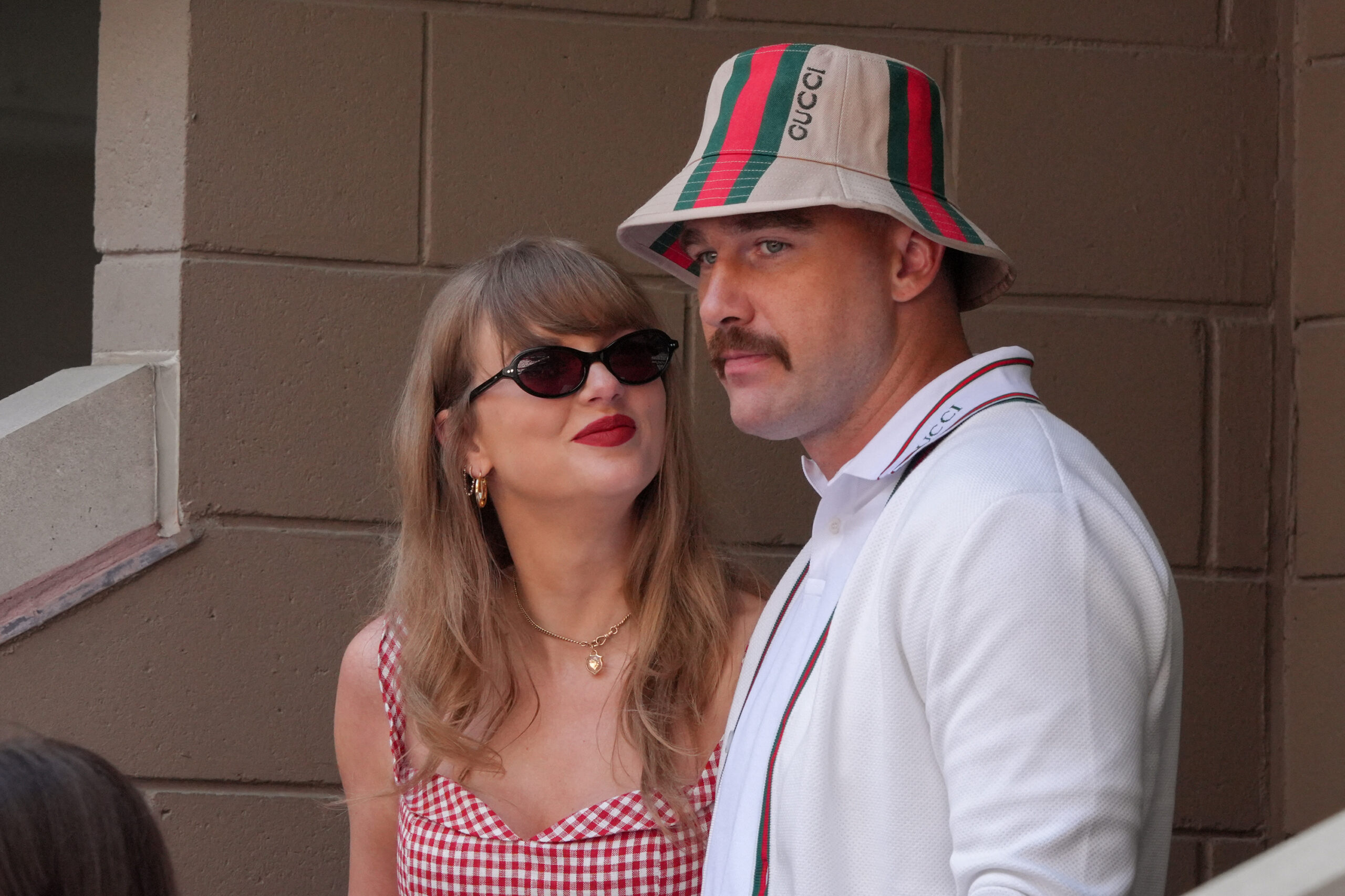 Taylor Swift, left, and Travis Kelce attend the men's final match of the U.S. Open tennis tournament at the USTA Billie Jean King National Tennis Center in New York on Sept. 8, 2024. (Timothy A. Clary/AFP/Getty Images/TNS)