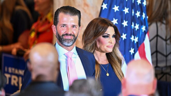 Donald Trump Jr. and Kimberly Guilfoyle attend former US president Donald Trump's press conference following his court appearance over an alleged 'hush-money' payment, at his Mar-a-Lago estate in Palm Beach, Florida, on April 4, 2023. (Photo by CHANDAN KHANNA / AFP) (Photo by CHANDAN KHANNA/AFP via Getty Images)