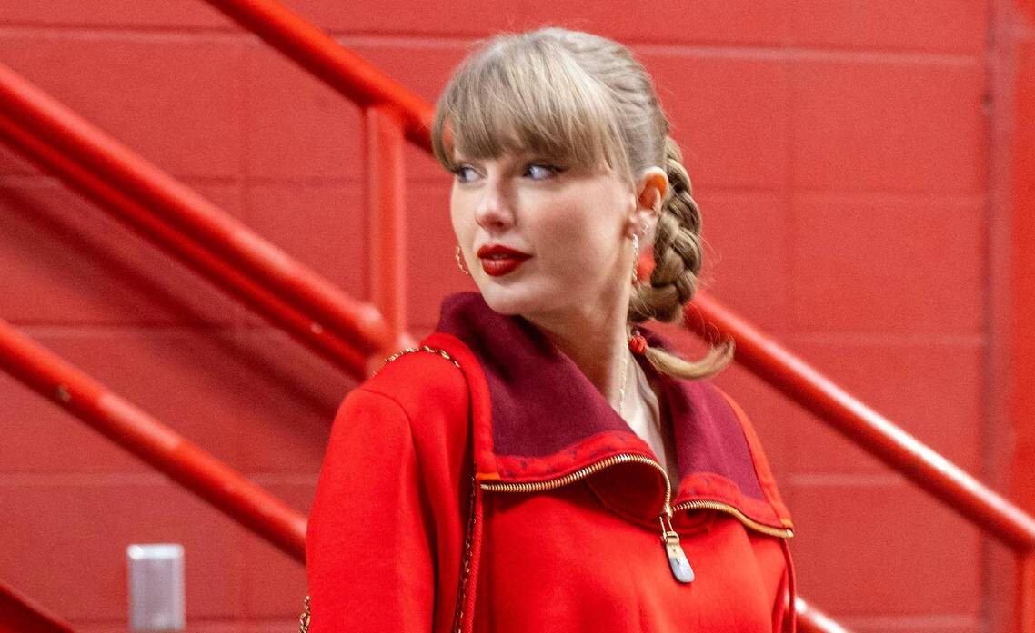 Taylor Swift returned to GEHA Field at Arrowhead Stadium on Friday wearing a sleek, cropped Louis Vuitton half-zip coat with skinny black jeans. She is on a break before wrapping up her Eras Tour on Dec. 8 in Canada.
