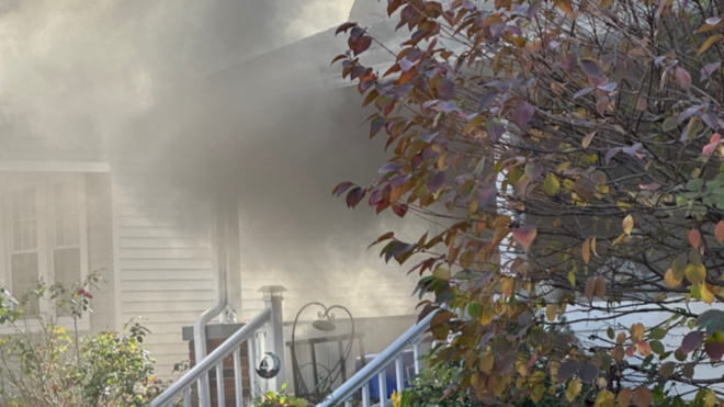 smoke coming out of the McAlinden family home in Michigan