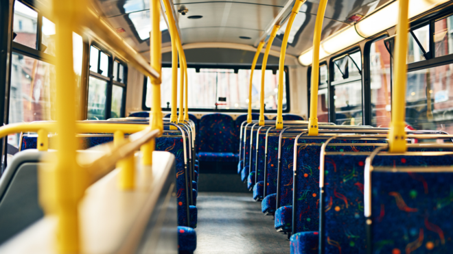 empty multicolored seats on a city bus