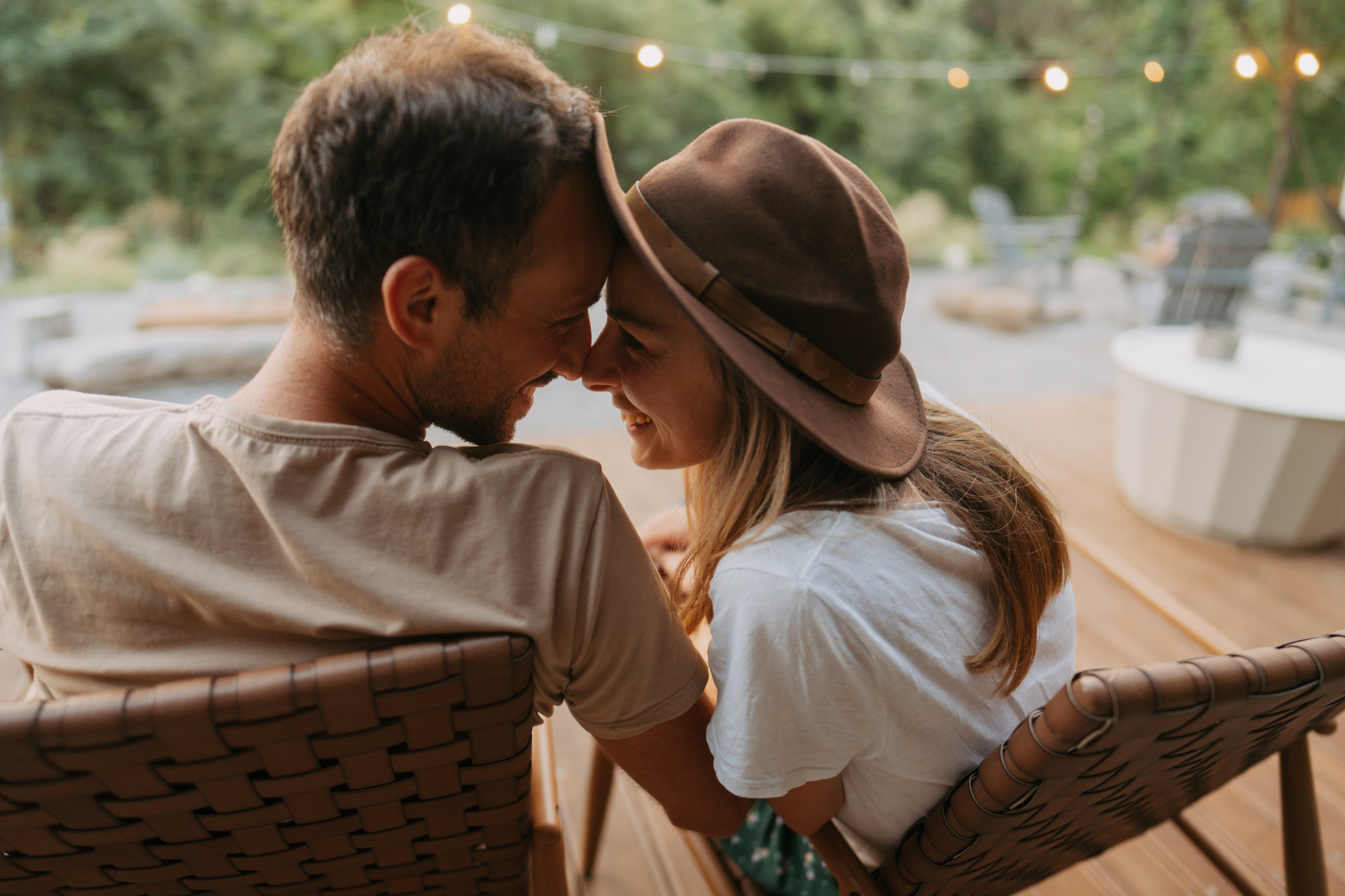 couple cuddling on porch