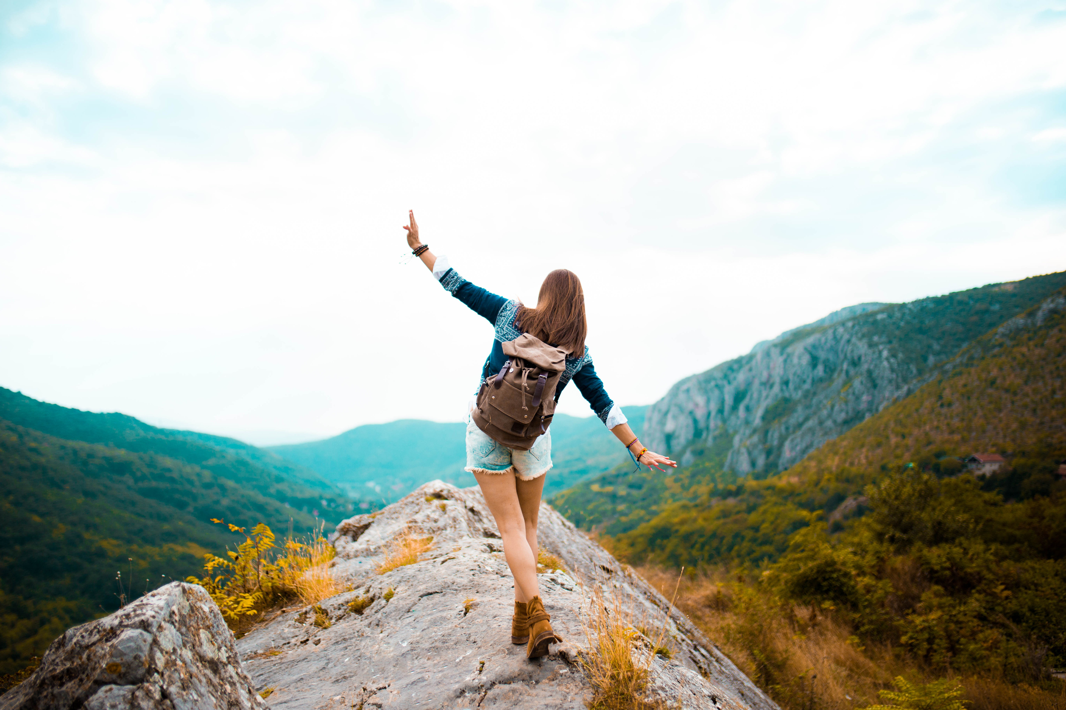 Hippie woman stroll on mountain