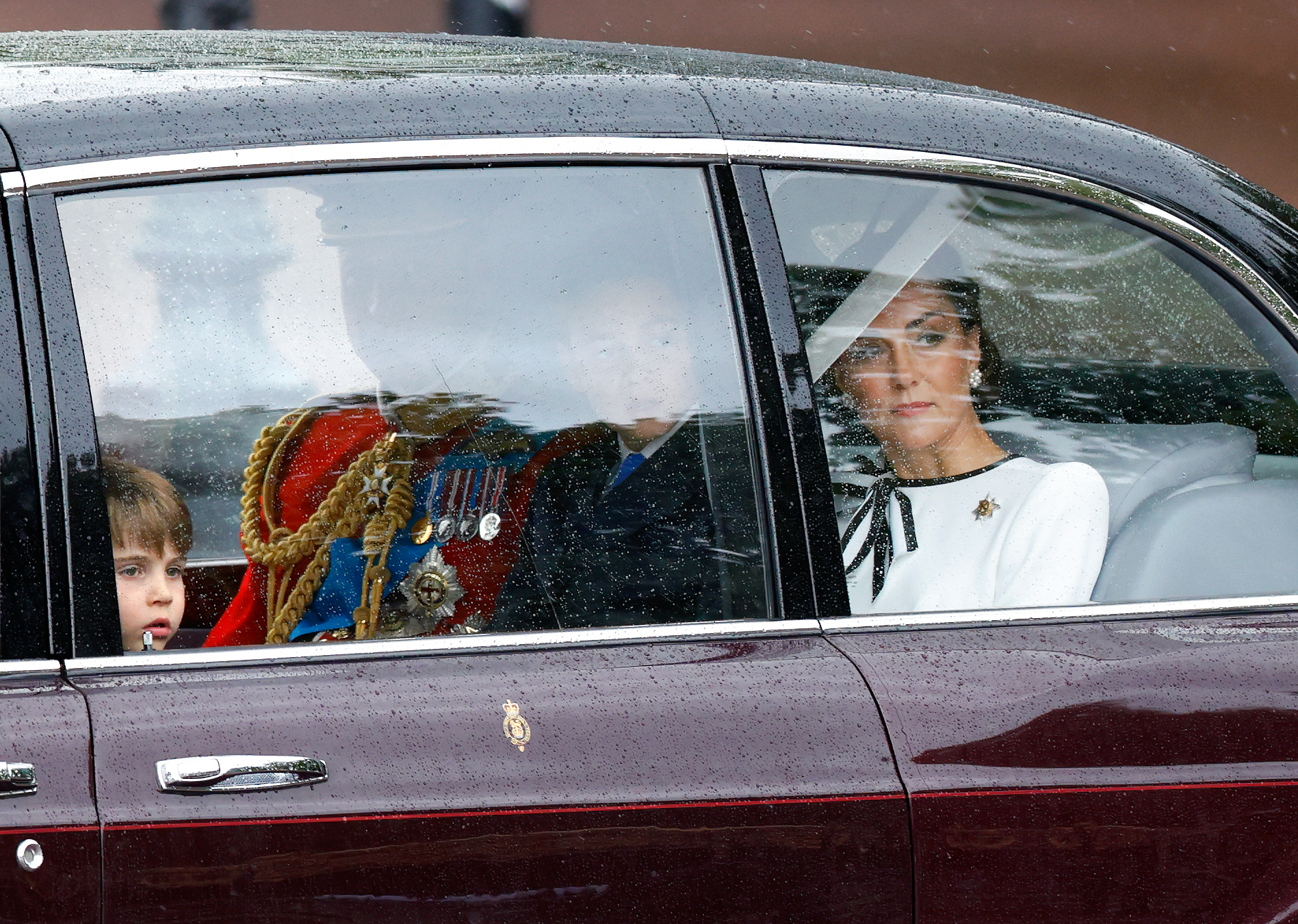 Royal family in car