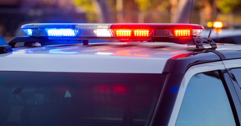 Top of the police car showing the red and blue sirens