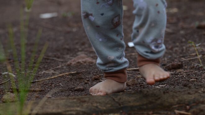 toddler outside barefoot