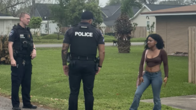 Akia Townes being questioned by Groves Police