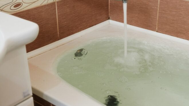 bathtub filling with water