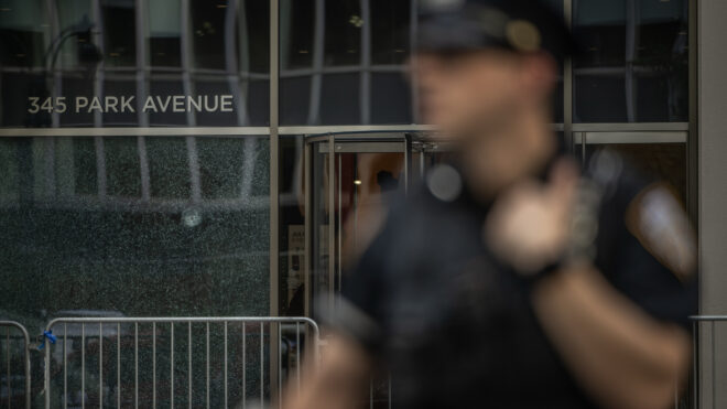 New York Police Department (NYPD) officers secure the scene of a shooting from Monday in New York, US, on Tuesday, July 29, 2025.