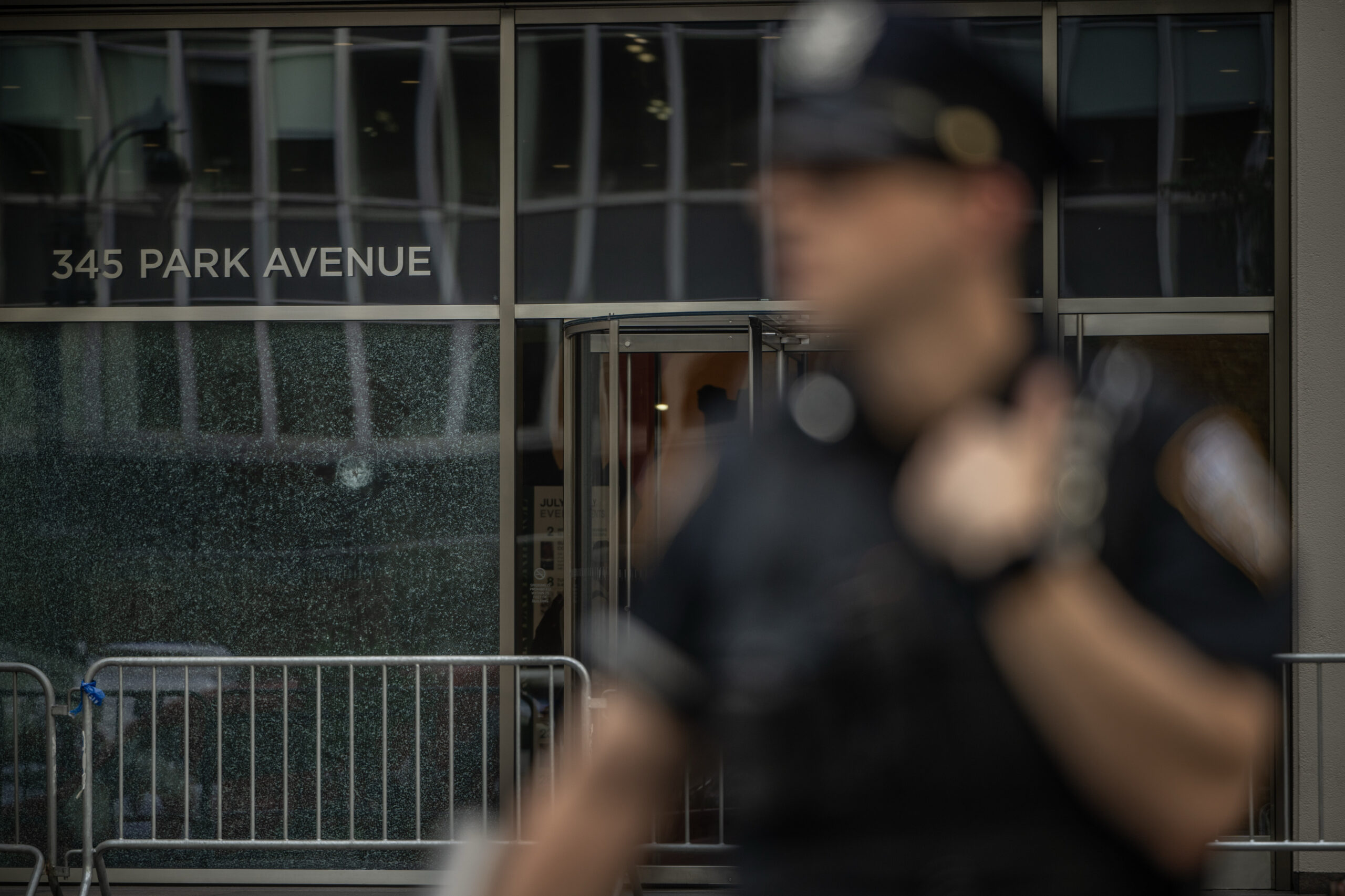New York Police Department (NYPD) officers secure the scene of a shooting from Monday in New York, US, on Tuesday, July 29, 2025.