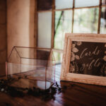 Card and gift box on table at wedding reception