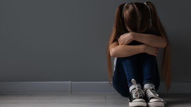 girl crying at school