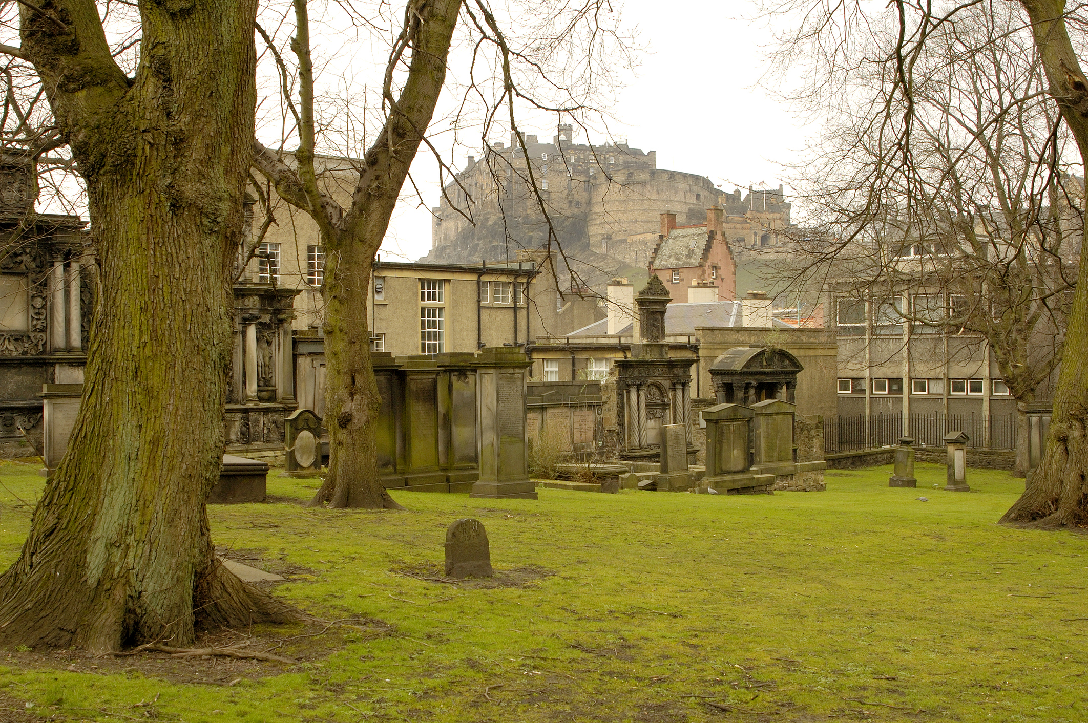 Greyfriars cemetery and Edinburgh castle in winter