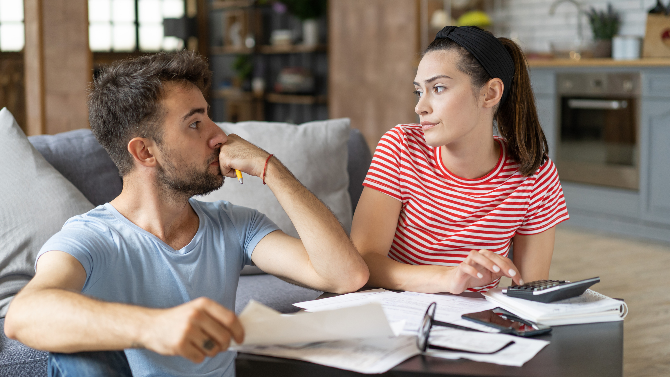 frustrated couple Frustrated couple doing expenses