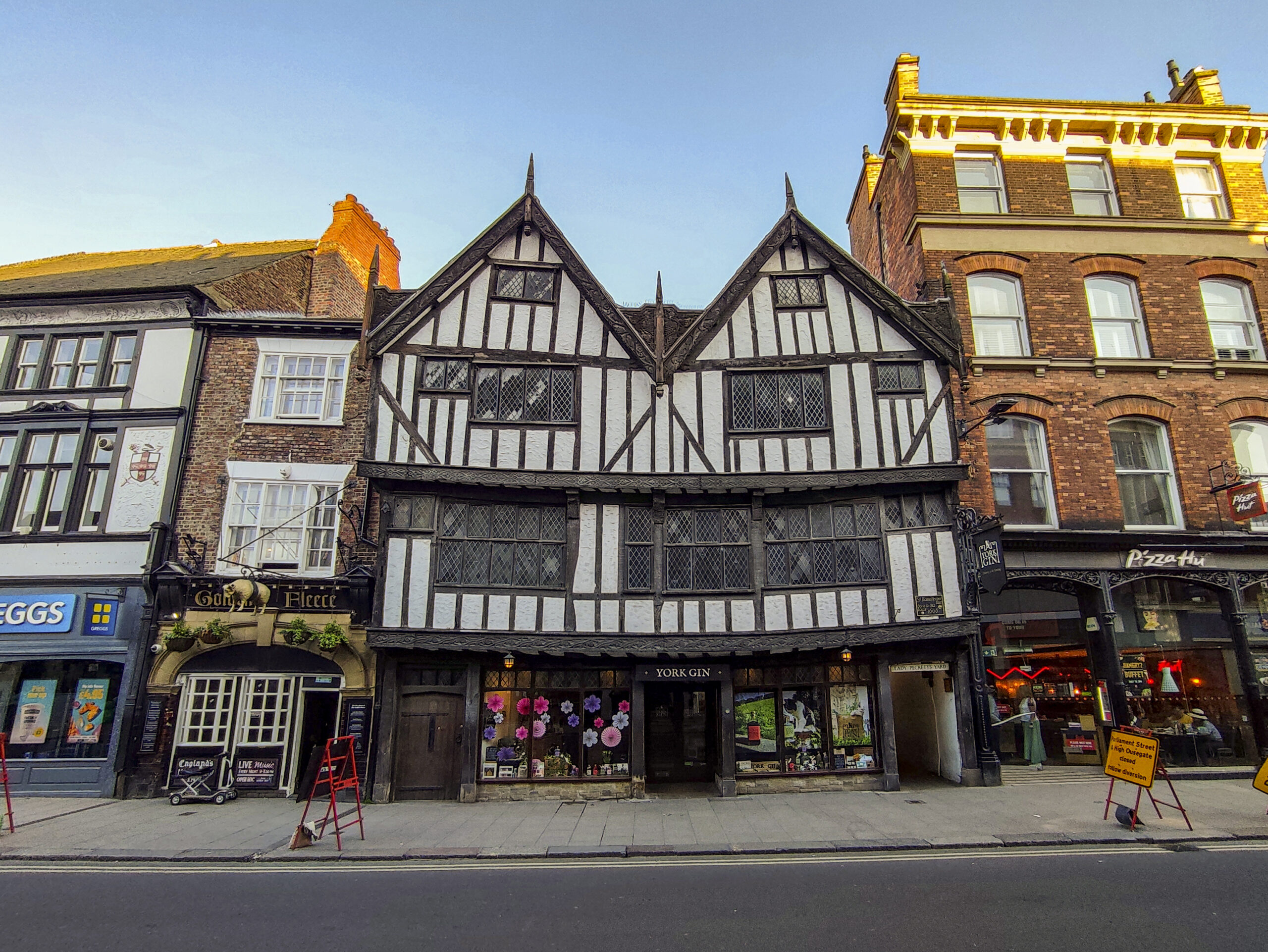 Old gothic tudor buildings at street of York England UK