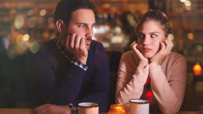 Sad couple having a conflict and relationship problems