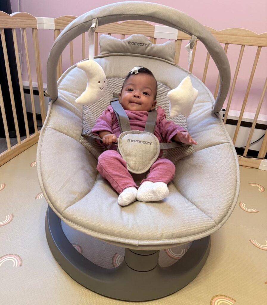 baby Laila in momcozy electric swing