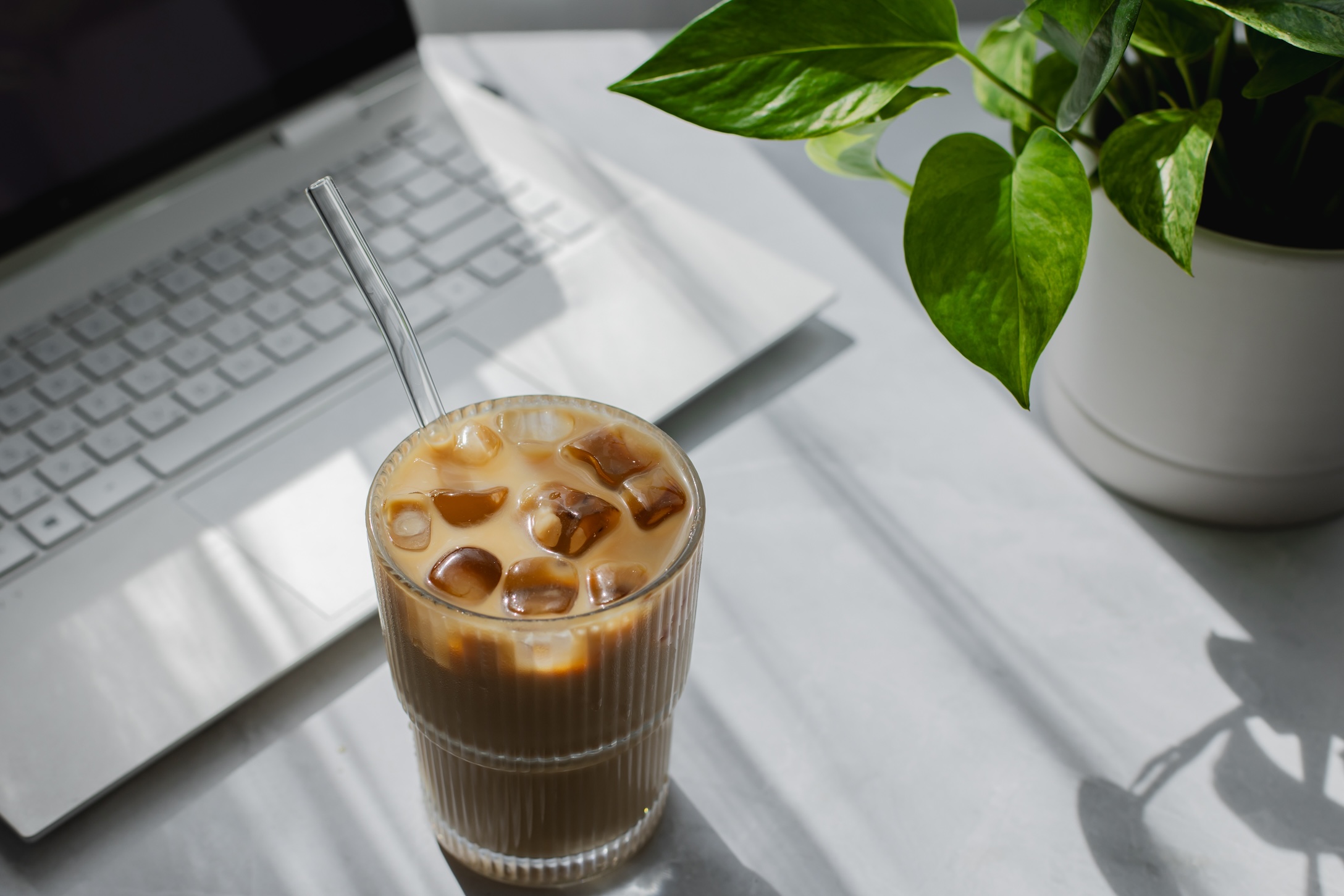 iced coffee with glass straw