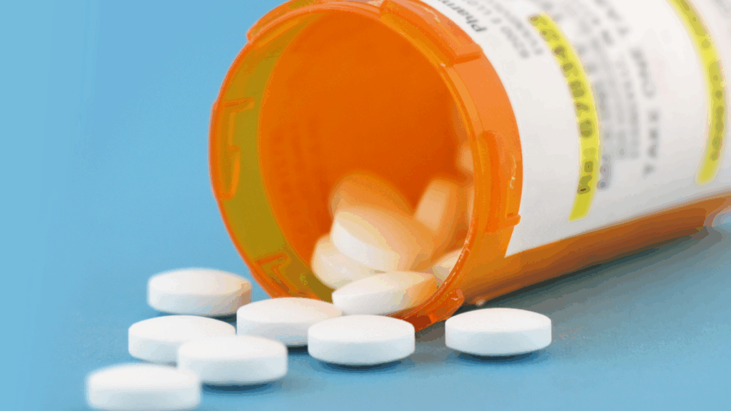 pills spilling out of bottle