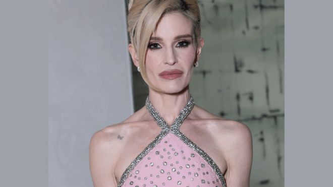 kelly osbourne with her hair up and in a pink dress