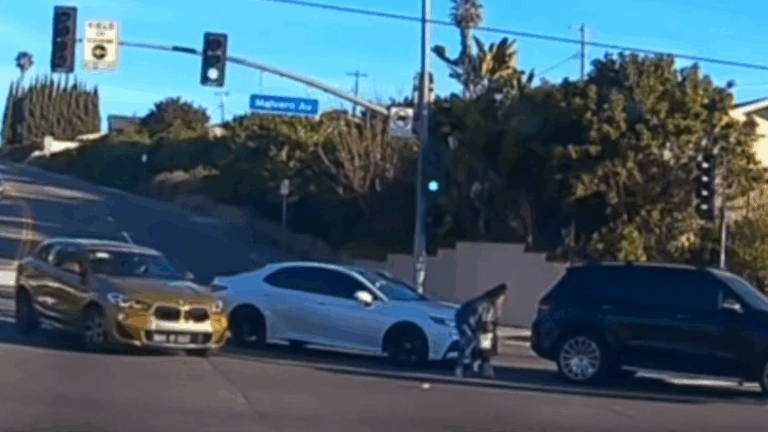Shocking Video Shows Baby Falling From Moving Car into Traffic