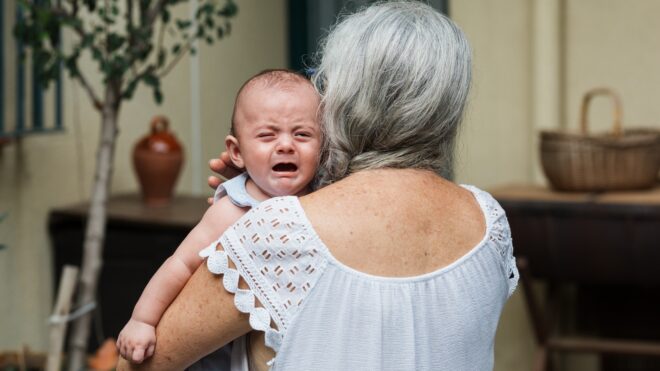 Grandma holding baby