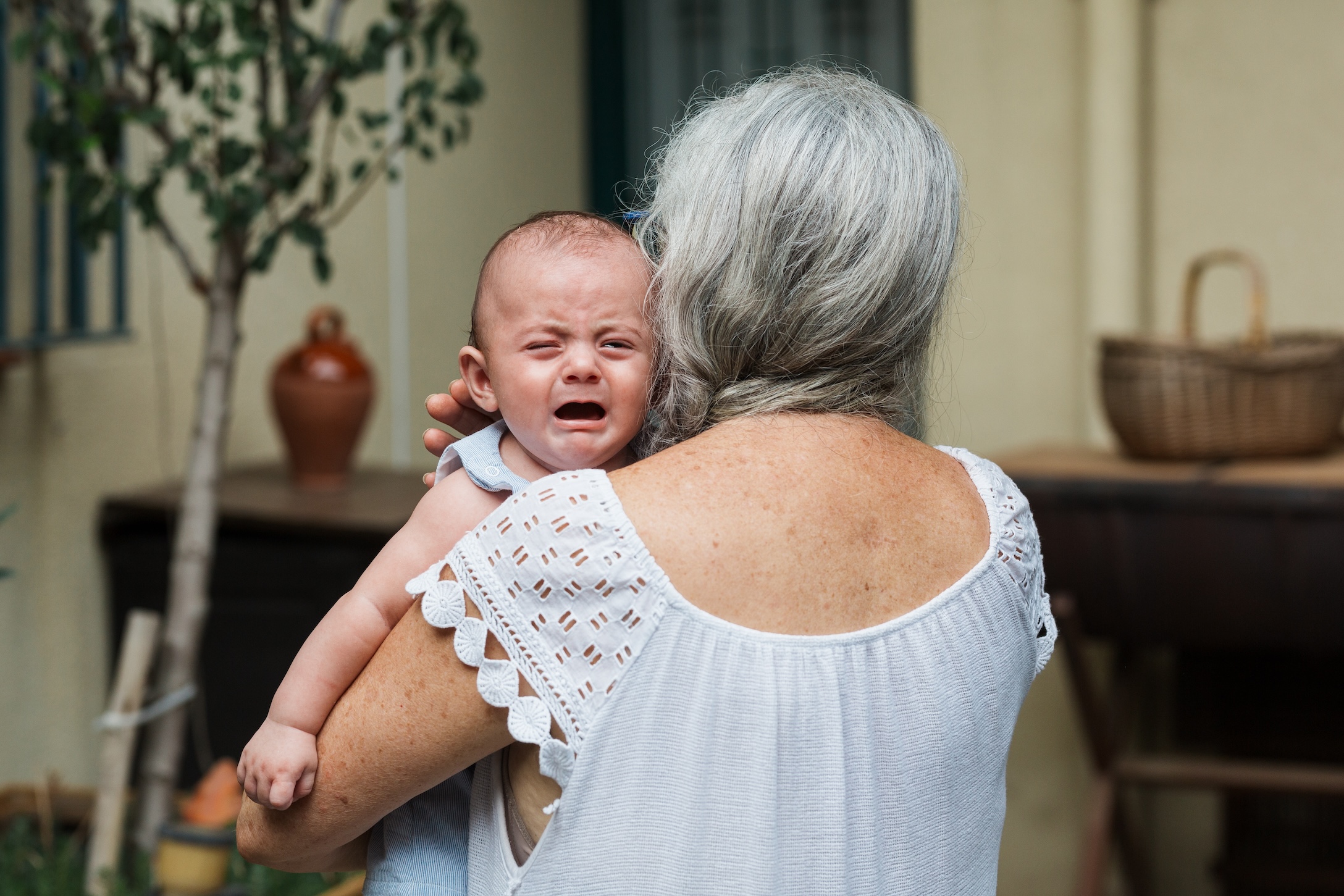 Grandma holding baby