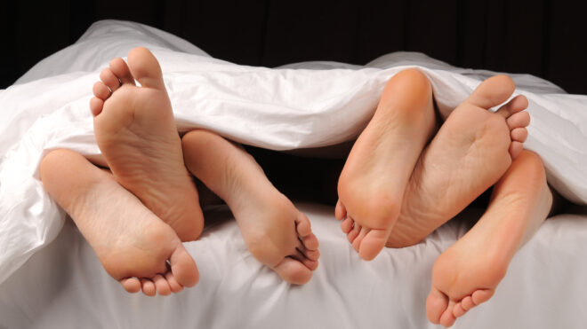 feet on the bed threesome