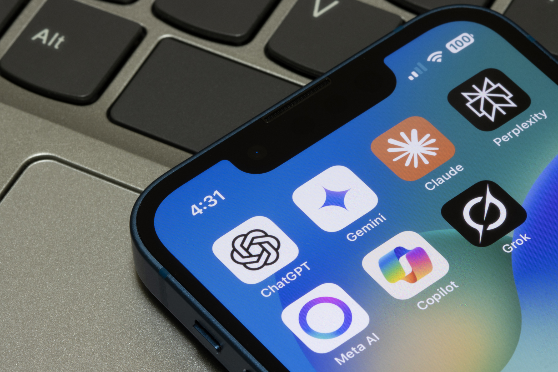 Portland, OR, USA - May 2, 2025: Assorted AI apps, including ChatGPT, Gemini, Claude, Perplexity, Meta AI, Microsoft Copilot, and Grok, are seen on the screen of an iPhone.