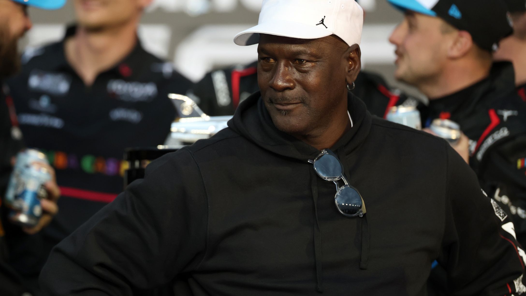 Michael Jordan in a white hat standing up at the NASCAR Cup Series Daytona 500 in February, 2026