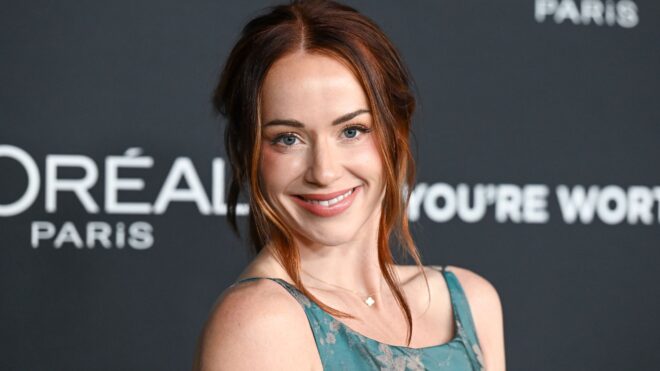 Whitney Leavitt posing on the carpet at the 20th Anniversary of L’Oreal Paris Women of Worth event in Los Angeles in December, 2025