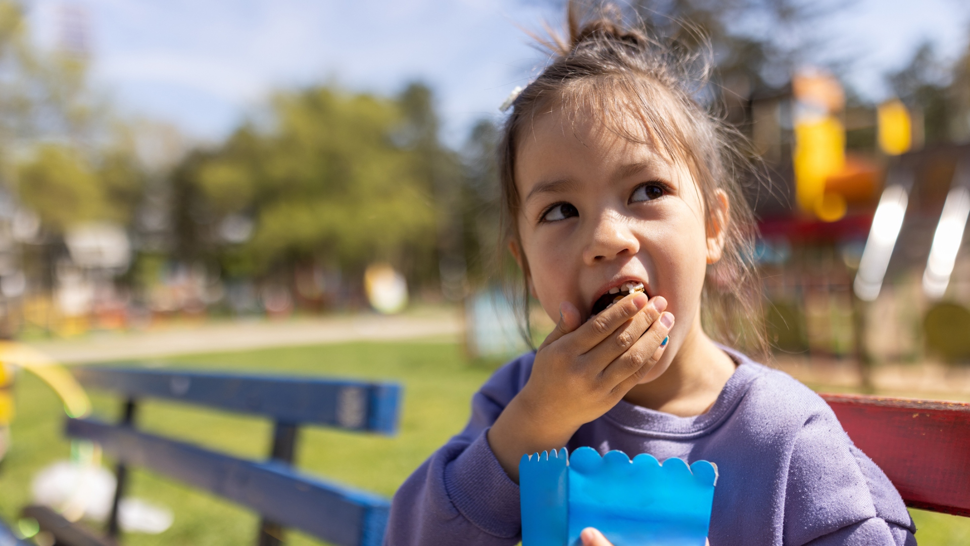 girl eating popcorn
