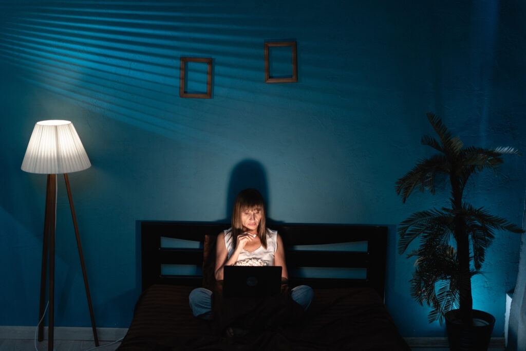 woman on laptop at night