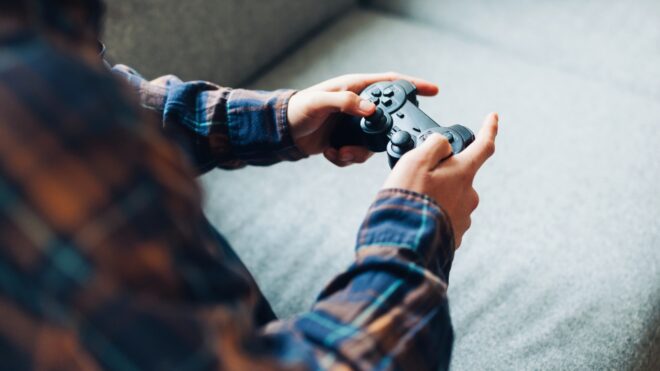 man playing video games