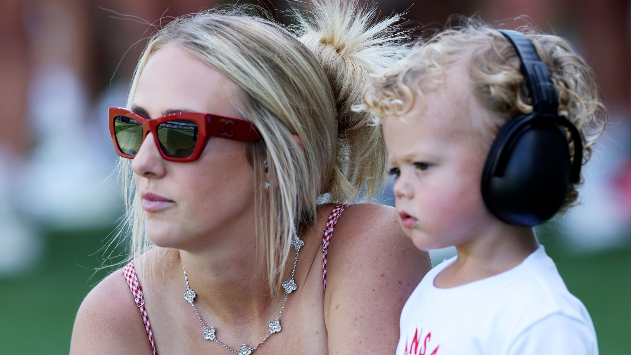 Brittany Mahomes, co-founder of the Kansas City Current, interacts with her son in 2025