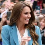 Catherine, Princess of Wales, gestures as she arrives at the city hall on the first day of her visit to Reggio Emilia